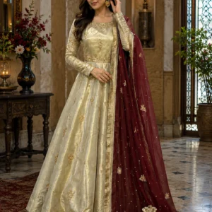 Model wearing a Golden Radiance Heritage Farshi Lehnga with detailed hand-made Zari work