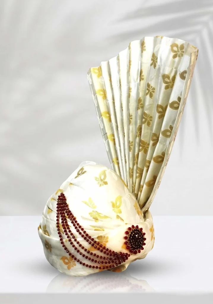 White Groom Turban with Golden Floral Pattern & Stone Brooch
