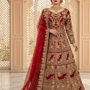 Deep red velvet bridal lehenga with gold zari work and net dupatta