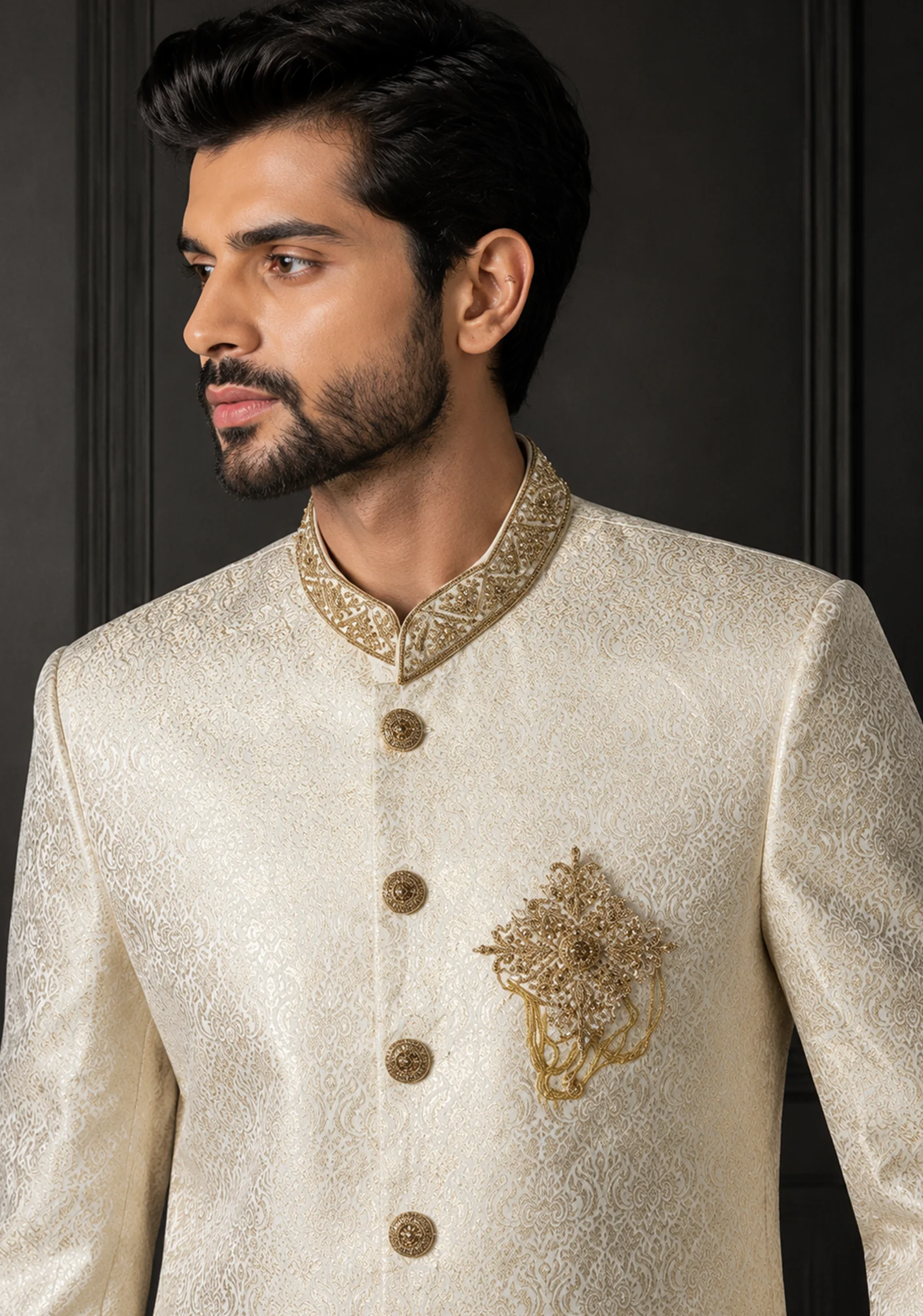 : A gentleman wearing the "Ivory Sovereign Heritage" premium sherwani, showcasing sharp tailoring and refined Zari work surface ornamentation as seen in 9.webp, 10.webp, 11.jpg, and 12.jpg.