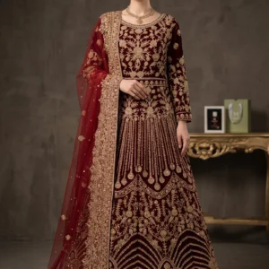 Maroon velvet lehenga with hand-made jewellery material work, Katan silk lining, and 4-side border net dupatta