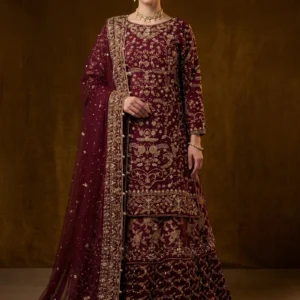 Front view of burgundy bridal shirt and lehenga with jewelry work