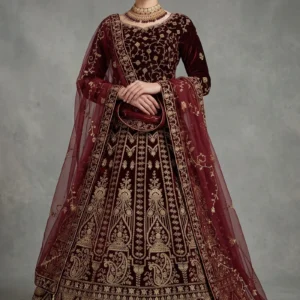Front view of a maroon velvet bridal lehenga with zari embroidery by AL Hassan Lehnga House.