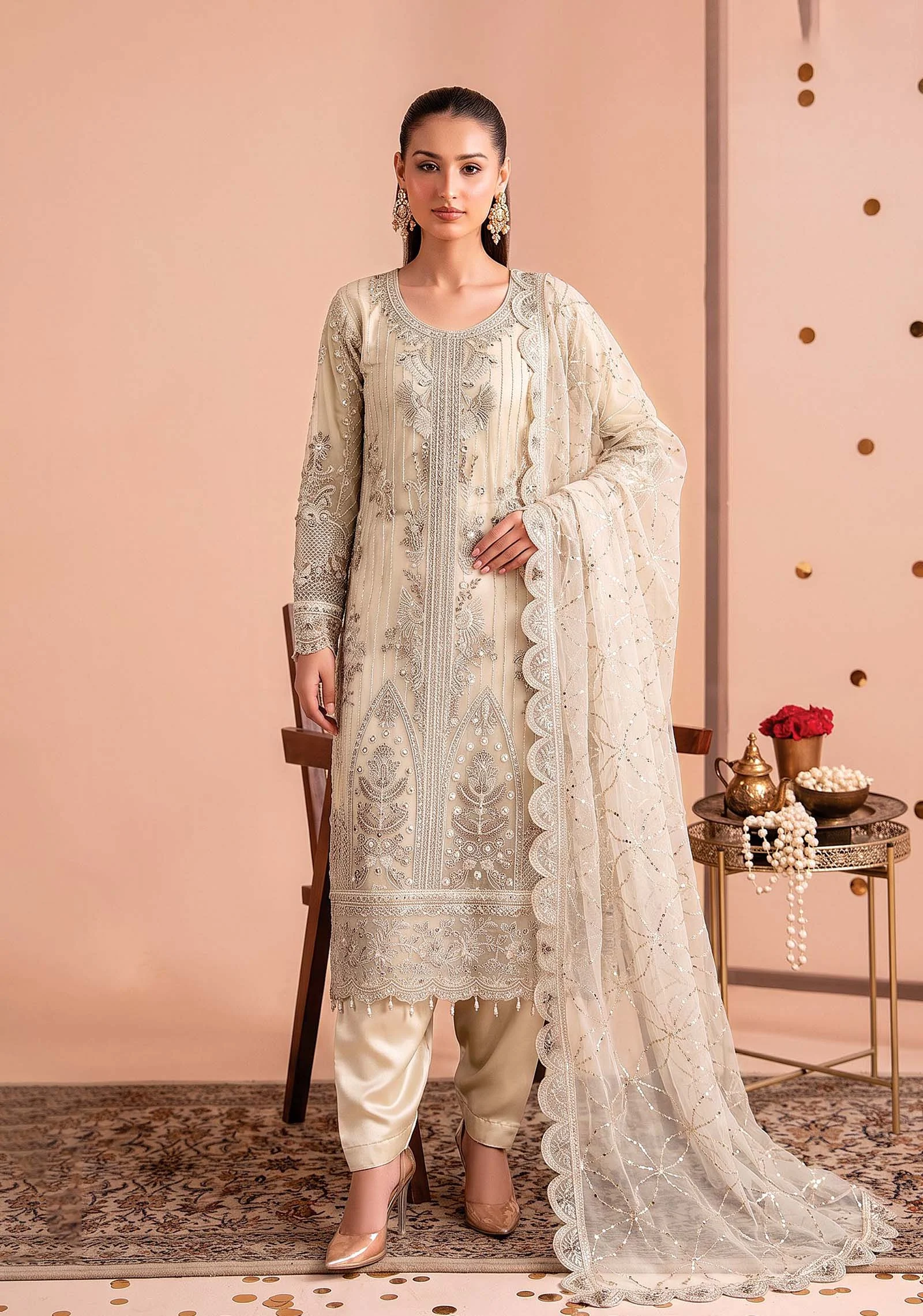 Front view of ivory Breeze Net fancy A-line suit by AL Hassan Lehnga House