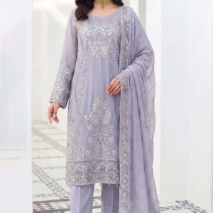 Full view of model wearing a mauve crinkle A-line suit with silver tilla work by AL Hassan Lehnga House