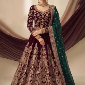 Front view of maroon velvet bridal gown with metallic floral work