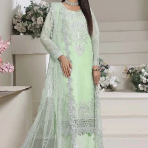 Full length view of a woman wearing a Mint Verdant Lawa Silk 3pc formal suit by AL Hassan Lehnga House