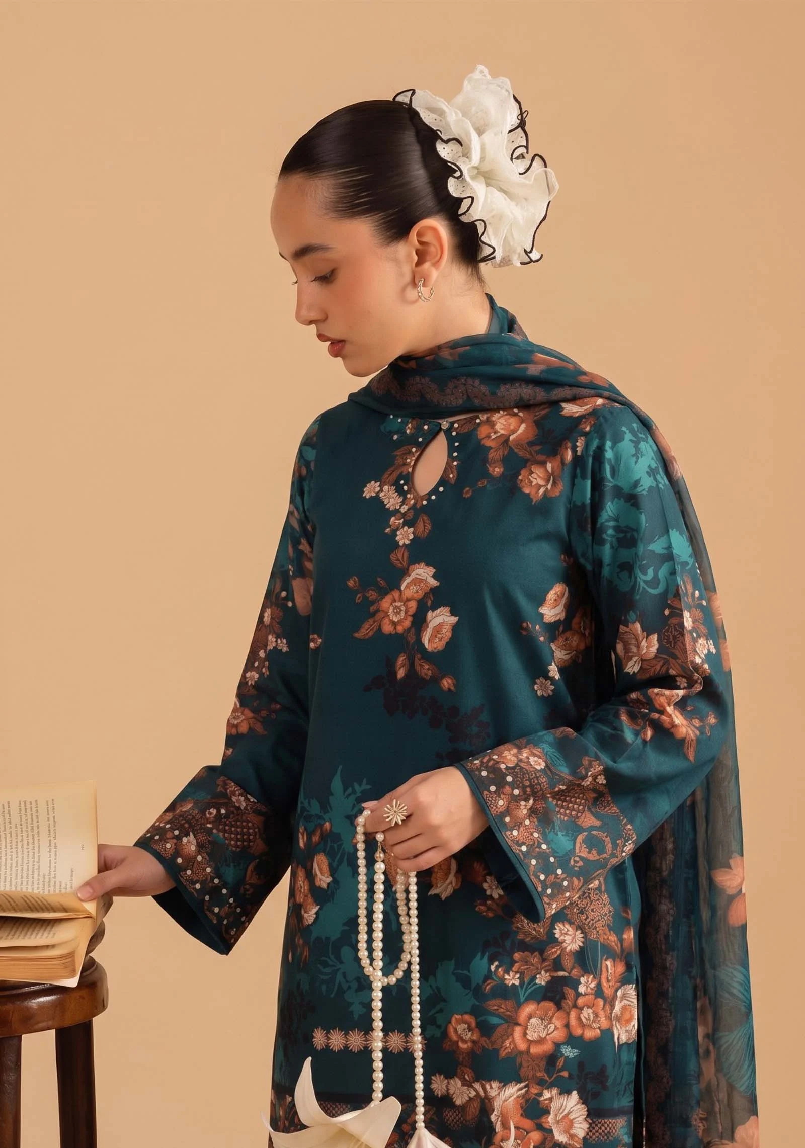 Close up of keyhole neckline with pearl work AL Hassan Lehnga House :