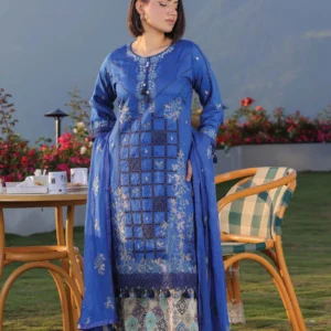 Woman wearing a royal blue lawn suit with white embroidery by AL Hassan Lehnga House