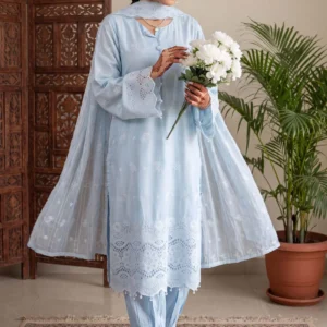 Model wearing a light blue Schiffli viscose suit with pearl detailing by AL Hassan Lehnga House