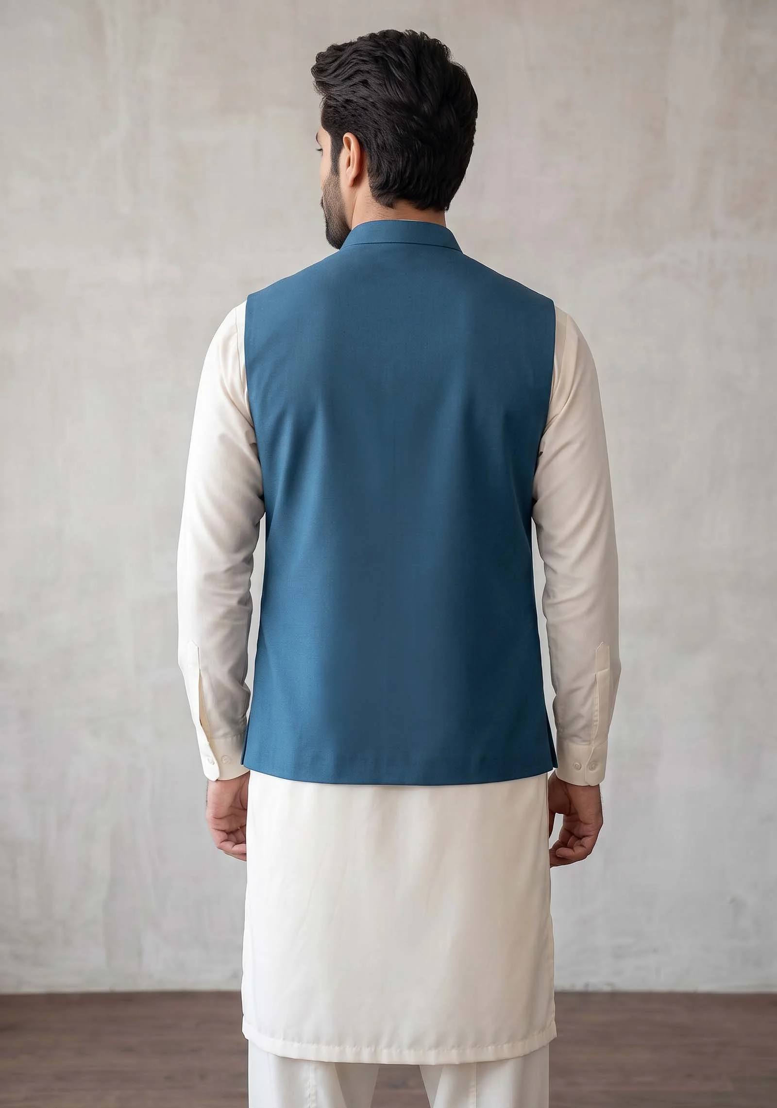 Back view of teal waistcoat showing plain silk lining fabric AL Hassan Lehnga House