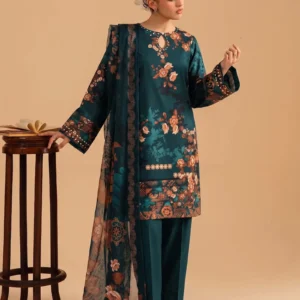 Model wearing a teal 3 piece suit with floral motifs from AL Hassan Lehnga House :
