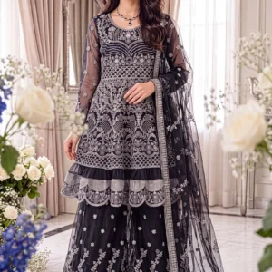Navy blue net peplum and sharara suit with heavy zari work by AL Hassan Lehnga House